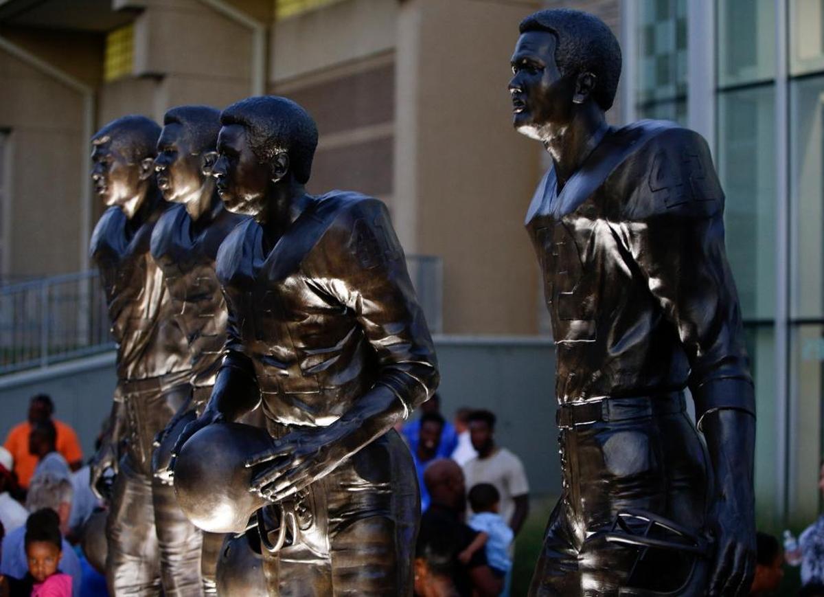 The statue on the University of Kentucky campus of the four UK football players who broke the SEC color barrier: Nate Northington, Greg Page, Wilbur Hackett and Houston Hogg.