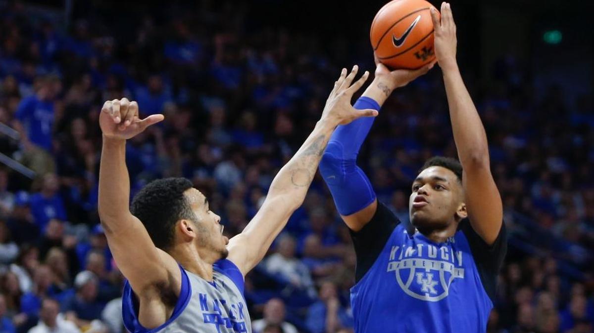 Kentucky freshman forward PJ Washington shoots a jumper over teammate Sacha Killeya-Jones during the UK’s preseason Blue-White Game. On a Wildcats roster with no scholarship player from the state of Kentucky, Washington has the distinction of having been born in Louisville in 1998 when his father, Paul Washington, worked as a salesman for Black and Decker.