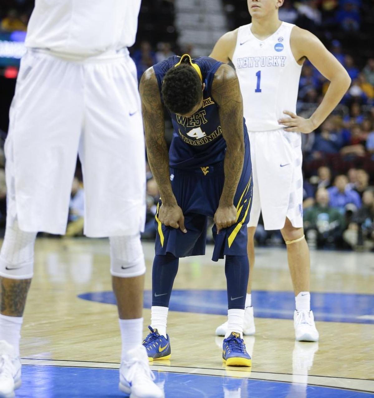 West Virginia guard Daxter Miles Jr. — who had predicted that unbeaten Kentucky would cease being unbeaten after facing the Mountaineers in the 2015 NCAA Tournament round of 16 — hung his head in the second half of what became a 78-39 UK rout of WVU.