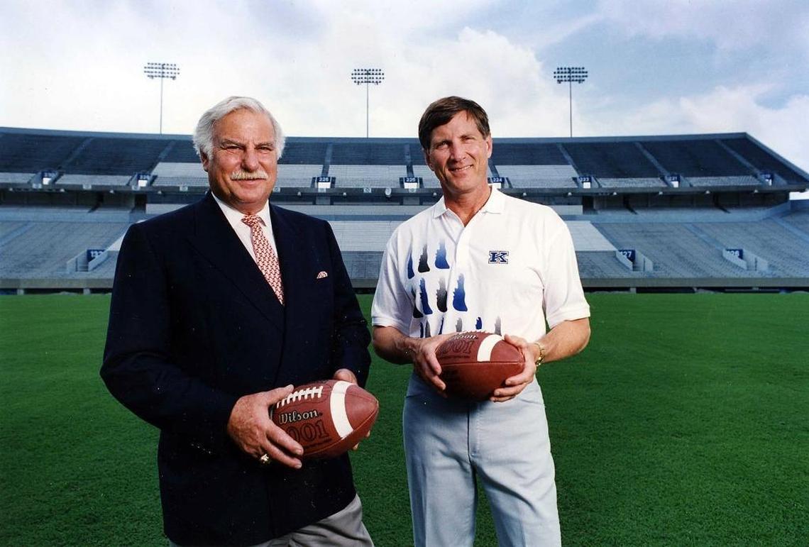 Louisville Coach Howard Schnellenberger, left, and Kentucky Coach Bill Curry posed together after a June 25, 1993, news conference to announce that the schools — who had not met since 1924 — would resume playing the following year. Billed as “Game One,” UK won the renewal 20-14 in 1994 but U of L leads the modern rivalry 15-14.
