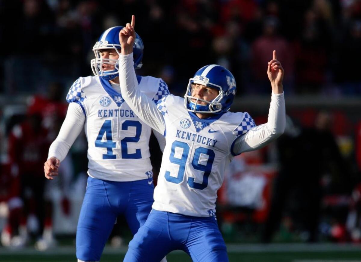 Kentucky place-kicker Austin MacGinnis, No. 99, celebrated after his 47-yard field goal with 18 seconds left gave UK its winning marging in the Wildcats’ 41-38 upset of No. 11 Louisville last season.