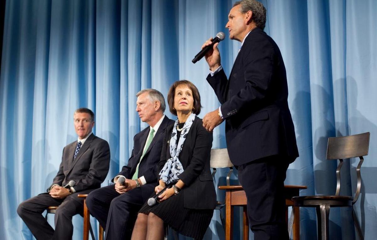 North Carolina Athletics Director Bubba Cunningham addressed the media in 2014 during a news conference following the the release of release of Ken Wainstein's investigation into academic fraud at the University of North Carolina.
