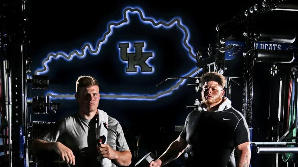 Quarterback Drew Barker, left, and nose guard Matt Elam were prized in-state recruits in Kentucky’s 2014 recruiting class that was ranked No. 17 in the country by Rivals.com. Both are leaving UK now after star-crossed careers.