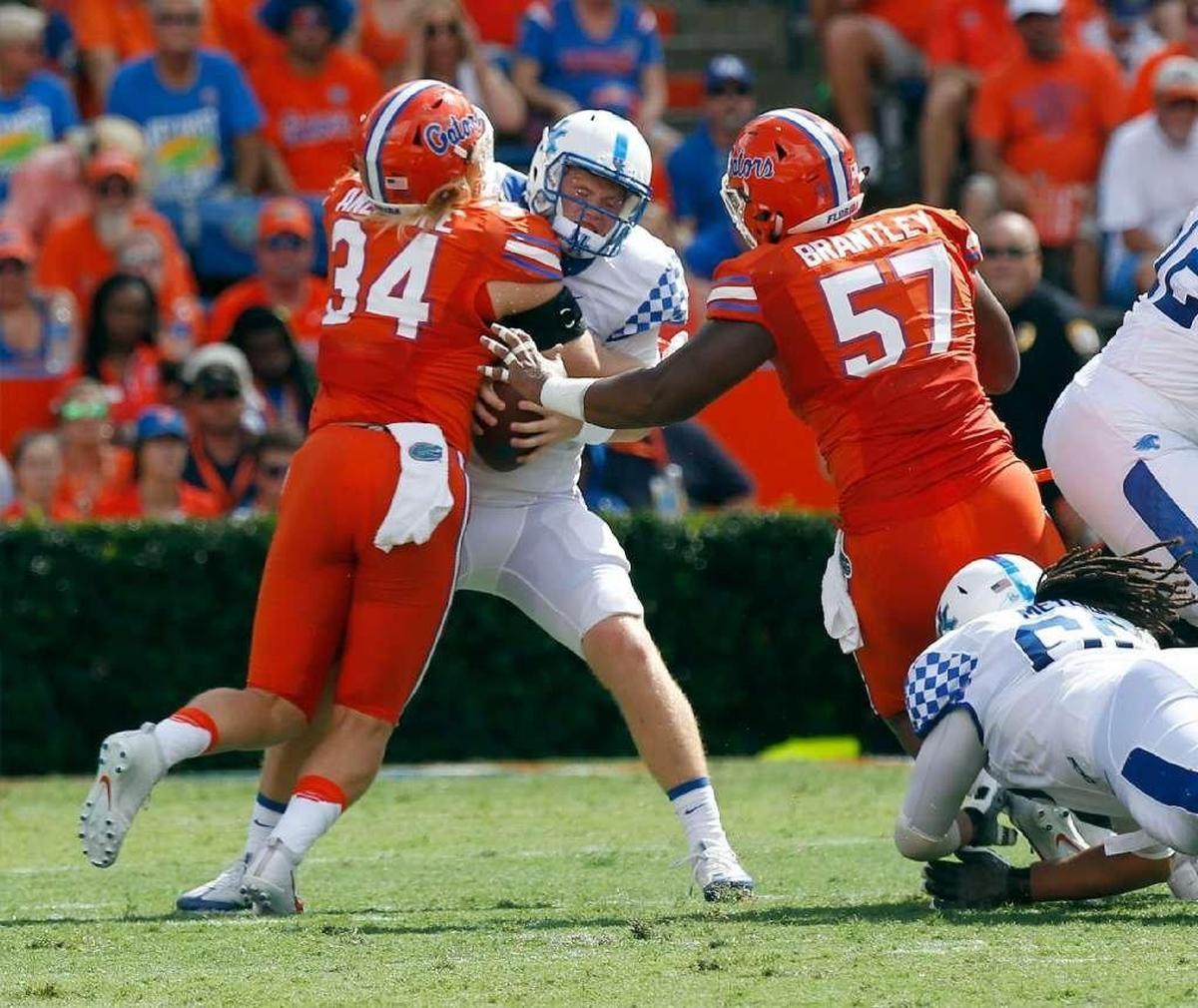Kentucky quarterback Drew Barker was crushed by Florida linebacker Alex Anzalone during last season’s 45-7 UK loss to the Gators.