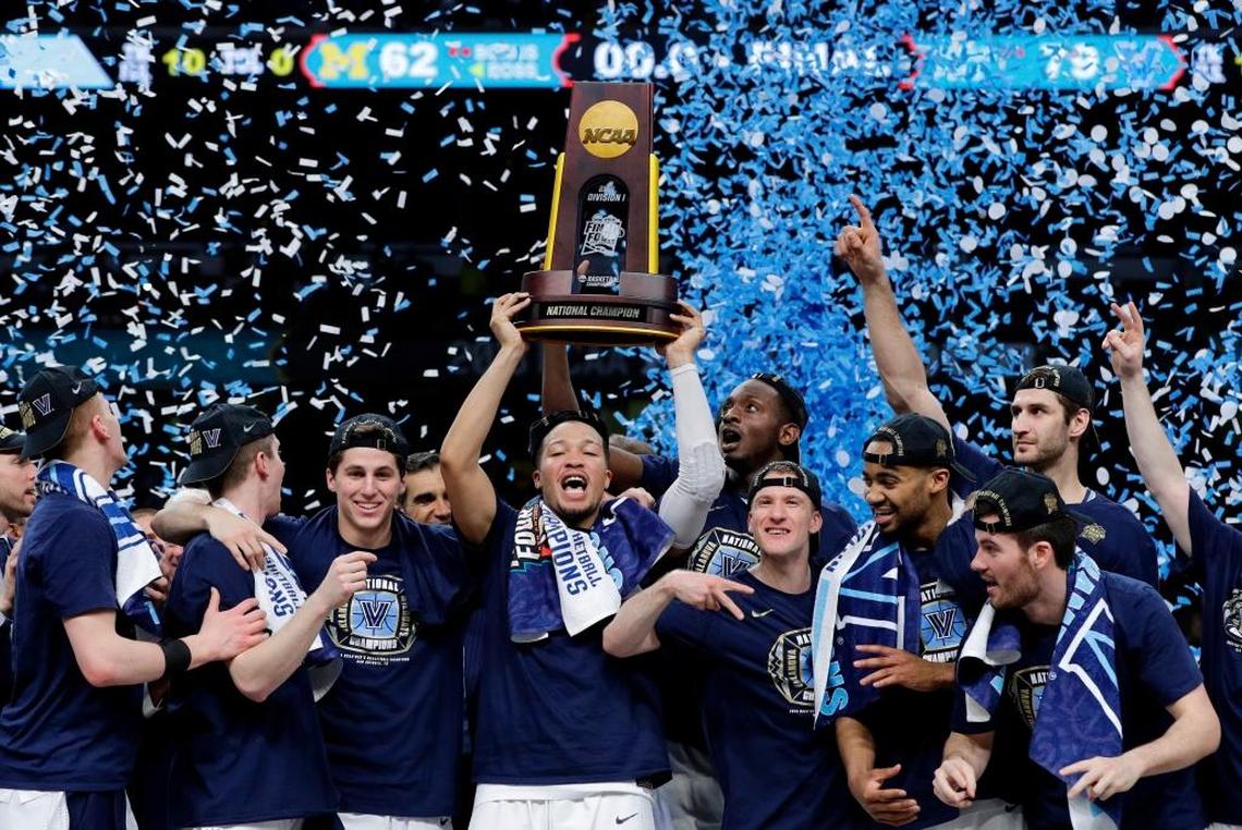 Villanova players celebrated with the championship trophy after beating Michigan 79-62 in 2018 NCAA men’s basketball tournament finals in San Antonio.