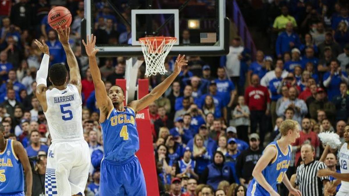 Kentucky Wildcats guard Andrew Harrison (5) rose to shoot a three-pointer against UCLA in UK’s 83-44 rout of the Bruins in 2014-15.