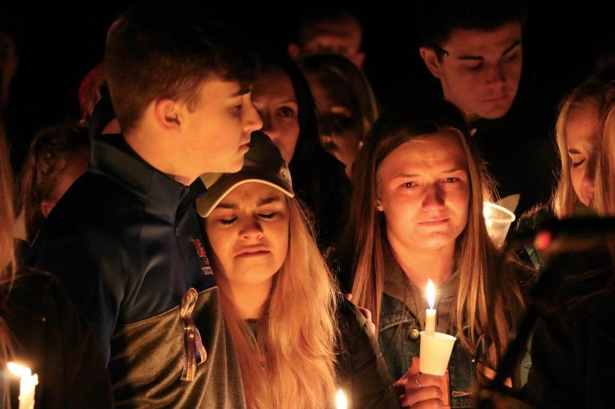 Mourners attended a vigil for the victims of a fatal shooting at Marshall County High School last week at Mike Miller County Park in Benton.