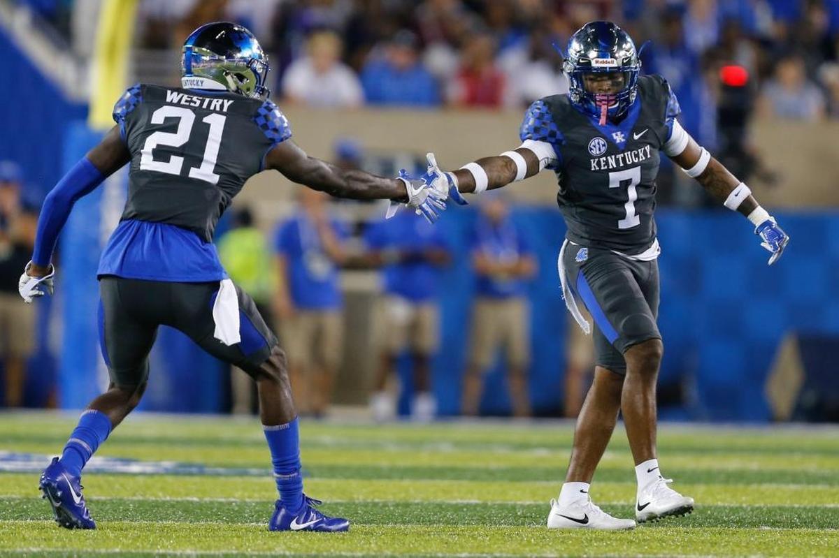 Kentucky safety Mike Edwards, No. 7, celebrated with cornerback Chris Westry, No. 21, after a third-down stop against Florida.