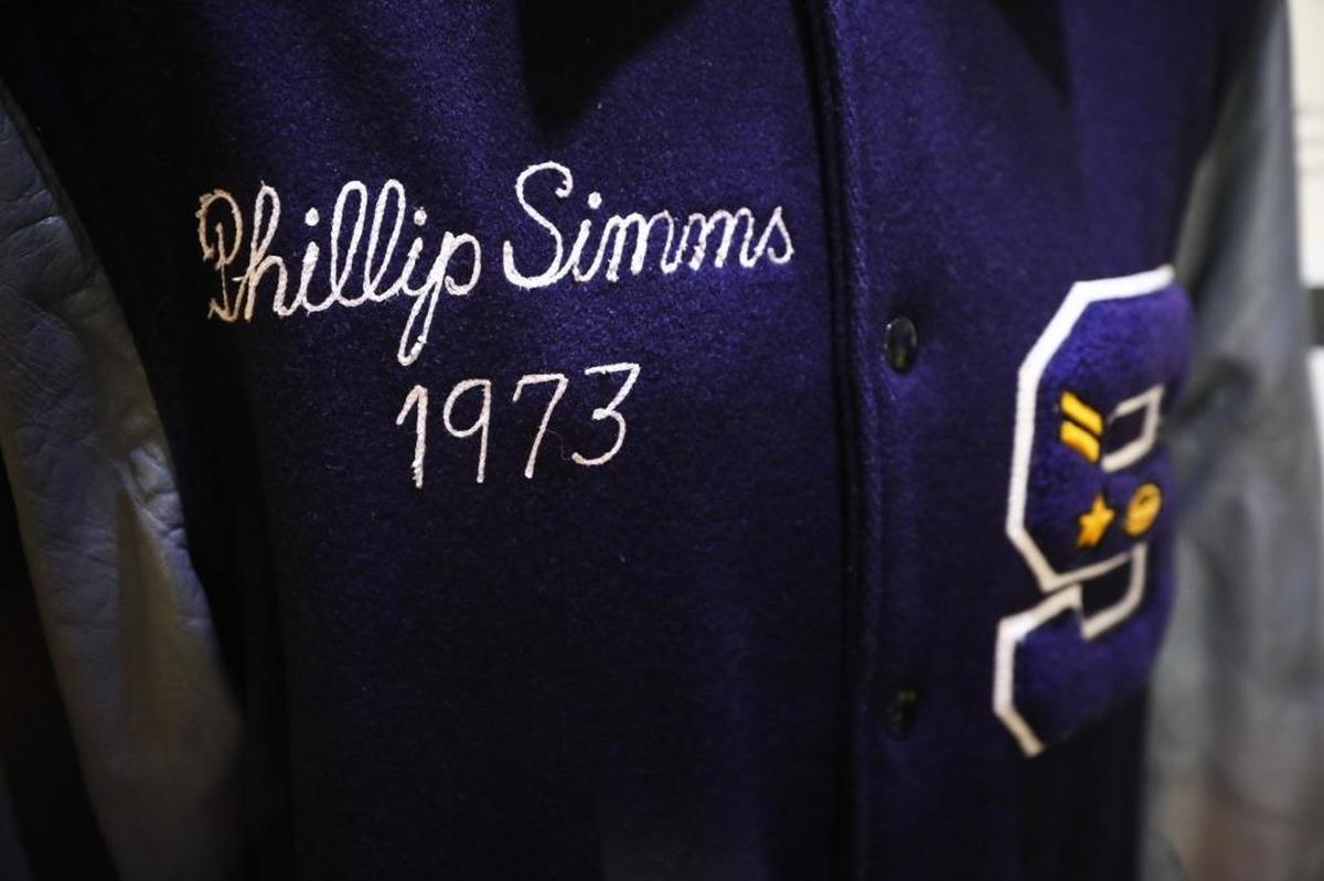 Phil Simms’s letter jacket from his days as a star quarterback at Southern High School in Louisville is on display with other memorabilia at the Phil Simms Exhibit located inside the Springfield Opera House.