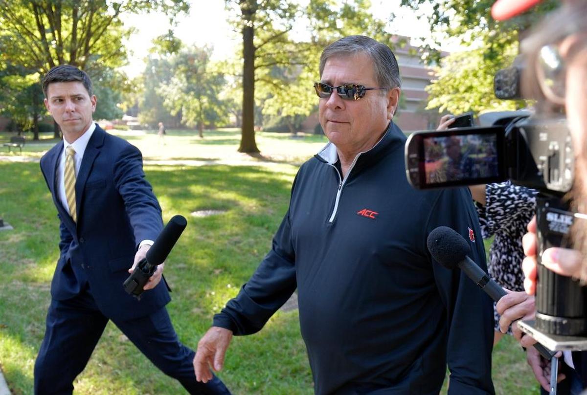 University of Louisville Athletics Director Tom Jurich arrived Wednesday for a meeting with U of L interim president Greg Postel. Later that day, Postel announced that Jurich has been placed on paid administrative leave.