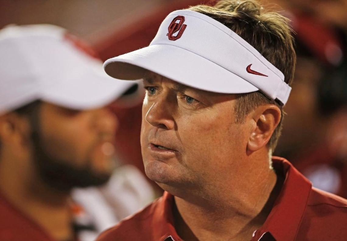 After 18 years as Oklahoma head football coach, Bob Stoops stepped down before the 2017 season. That leaves his younger brother, Kentucky Coach Mark Stoops, as the only FBS head man in the family.