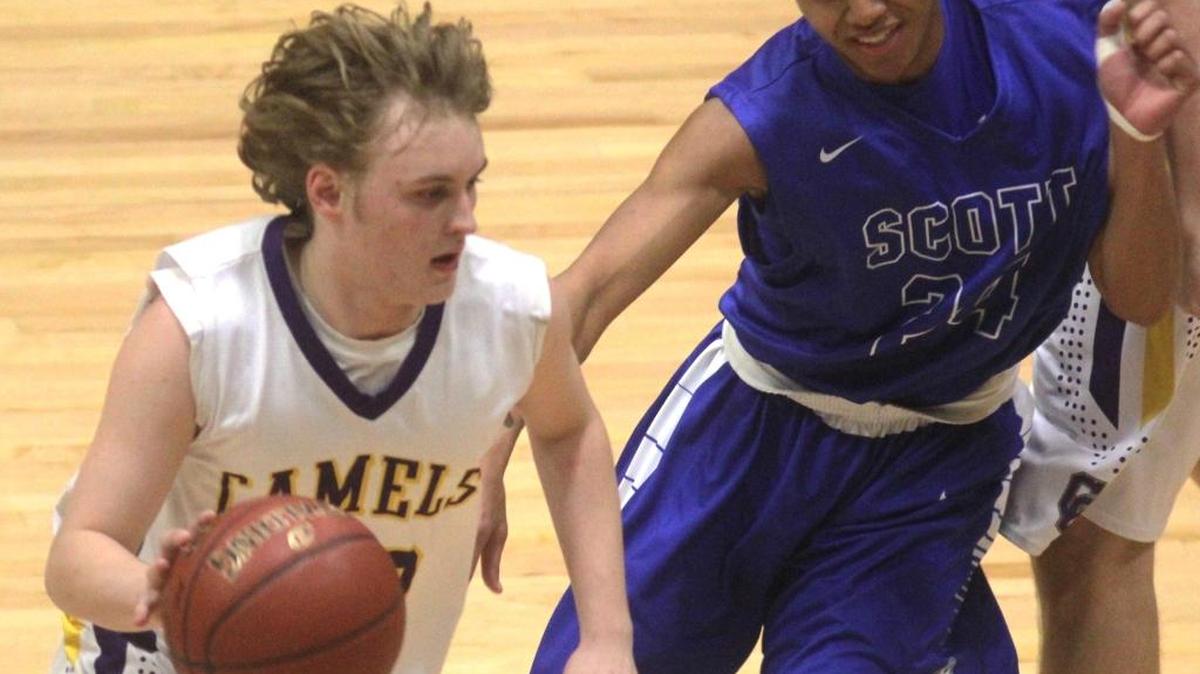Campbell County’s Joel Day, with ball, helped the Camels win the 2018 10th Region Tournament in spite of playing with “a fracture in his spine.”