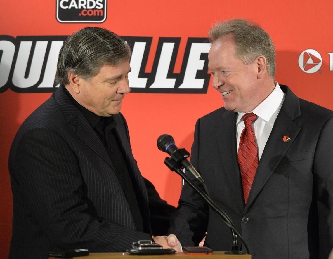 University of Louisville Athletics Director Tom Jurich, left, introduced Bobby Petrino as U of L head football coach for a second time in January 2014.