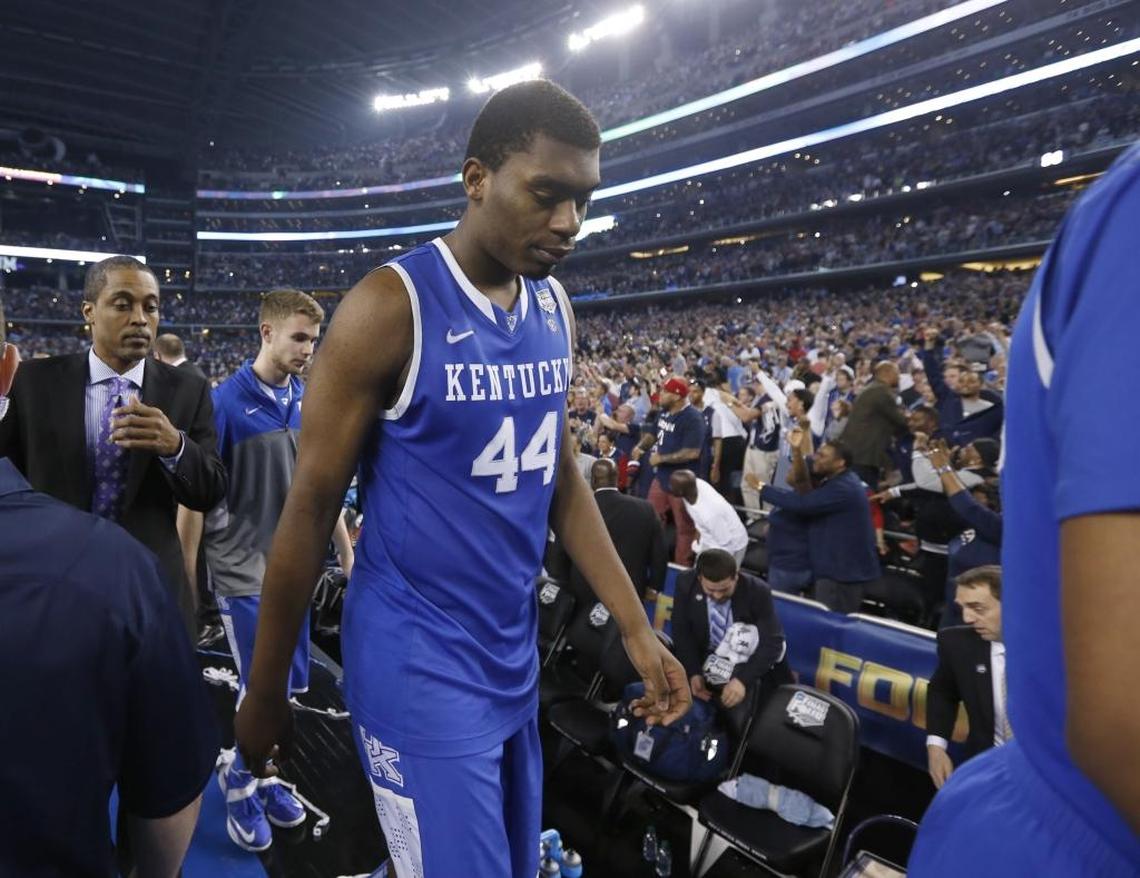 Kentucky’s Dakari Johnson walked from the court after the Wildcats lost to Connecticut 60-54 in the 2014 NCAA title game. The Cats missed 11 free throws in the game (13-of-24). Johnson was 1-of-4 from the foul line in the game.