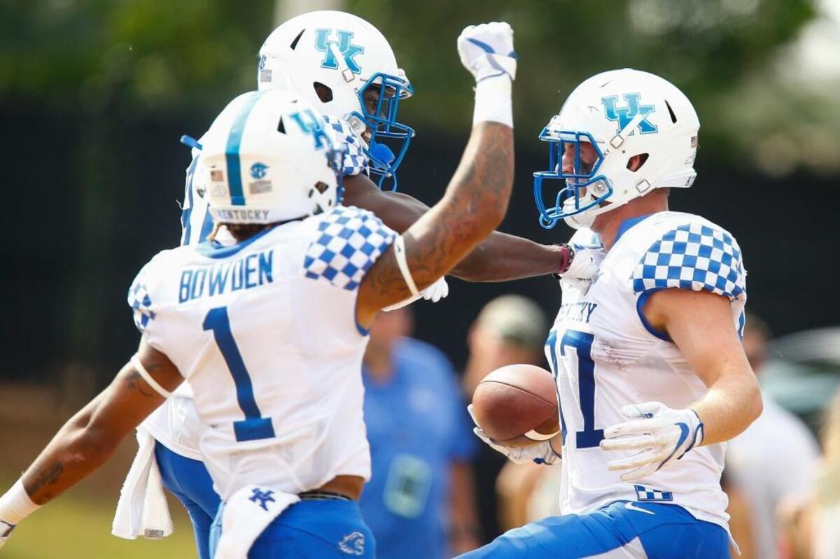 Kentucky tight end C.J. Conrad, with ball, celebrated with freshmen wideouts Lynn Bowden, No. 1, and Isaiah Epps after catching a 23-yard touchdown pass from Stephen Johnson during UK’s 24-17 victory at Southern Mississippi Saturday. Conrad led UK receivers with three catches for 97 yards.