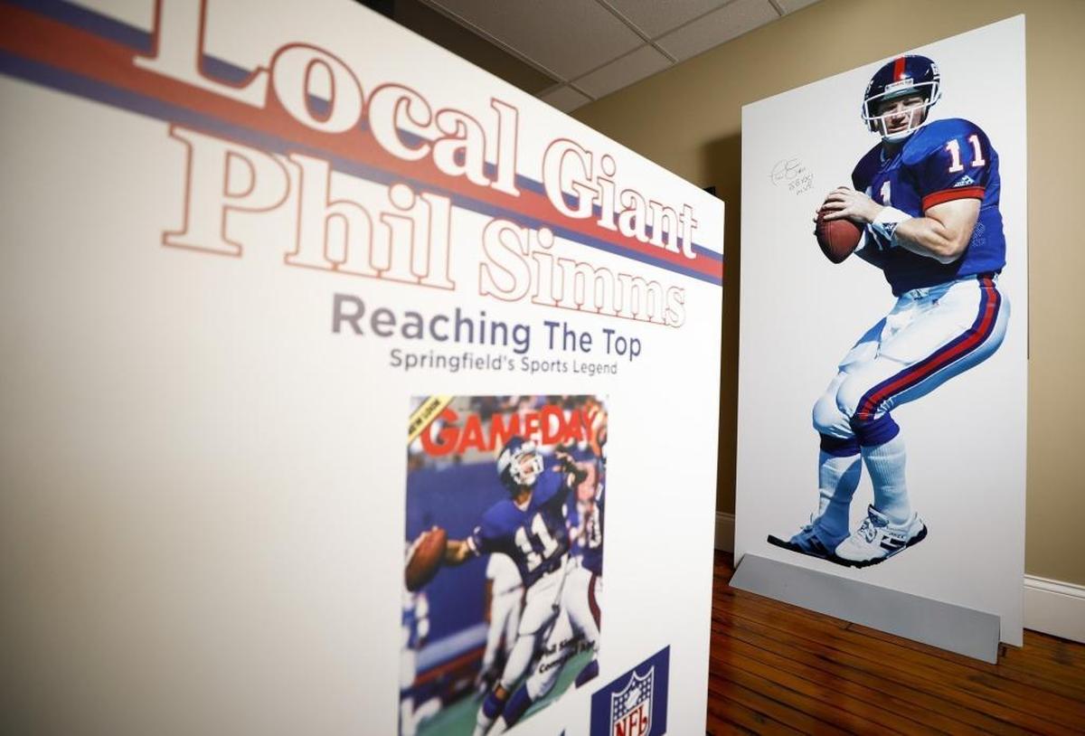 A life-size, signed poster of Phil Simms is on display with other memorabilia at the Phil Simms Exhibit located inside the Springfield Opera House in Springfield.