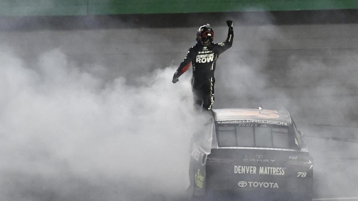 Martin Truex Jr. celebrated his first-ever victory at Kentucky Speedway on Saturday night.