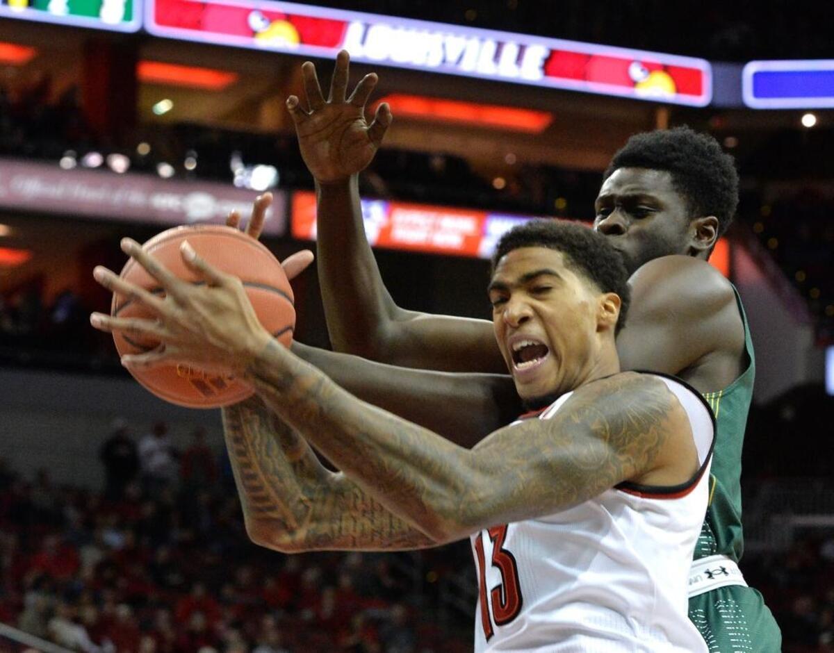 Former Trinity High School standout Ray Spalding, with ball, had a career-high 21 points and 16 rebounds to lead Louisville to a 74-56 win over Grand Canyon last Saturday. It was the 6-foot-10, 225-pound junior’s fifth double-double of the season.