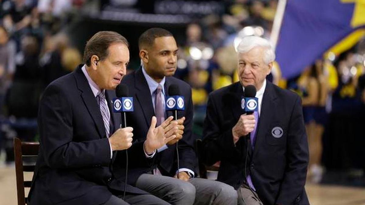 CBS broadcasters, left to right, play-by-play commentator Jim Nantz, along with game analyses Grant Hill and Bill Raftery work before NCAA college basketball game during the semifinals of the Big Ten Conference tournament in Indianapolis, Saturday, March 12, 2016.