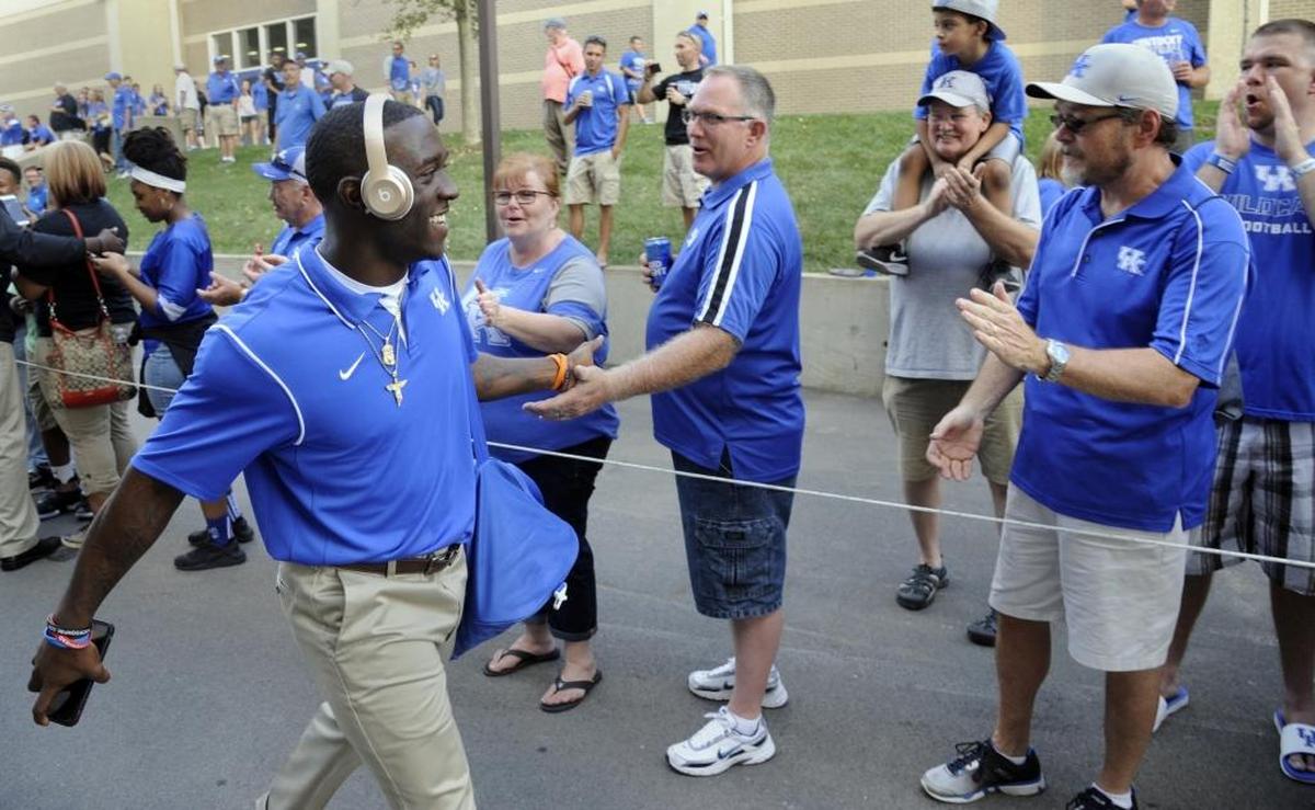 Then-Kentucky running back Boom Williams was greeted by fans during the Cat Walk prior to the University of Kentucky-South Carolina football game in 2016.