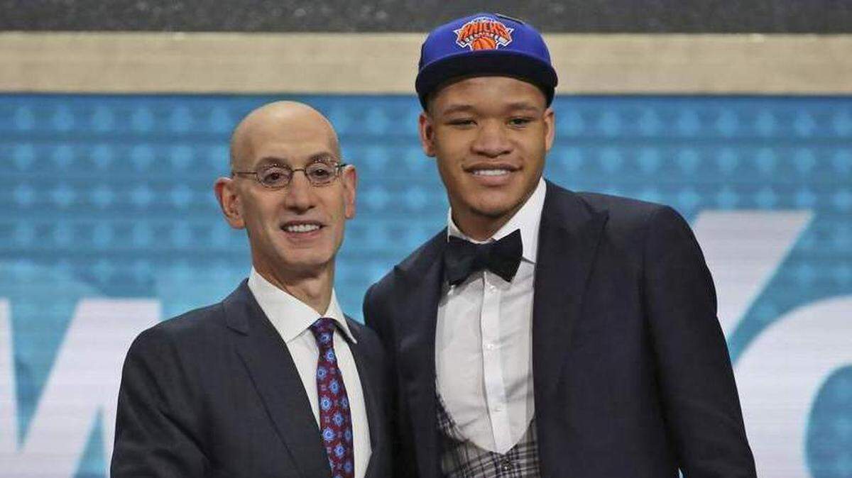 Kentucky's Kevin Knox, right, poses with NBA commissioner Adam Silver after he was picked ninth overall by the New York Knicks during the NBA draft in New York on Thursday, June 21, 2018.