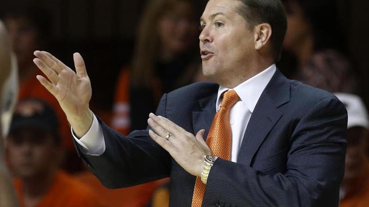 Oklahoma State basketball coach Travis Ford shown in a 2013 game.