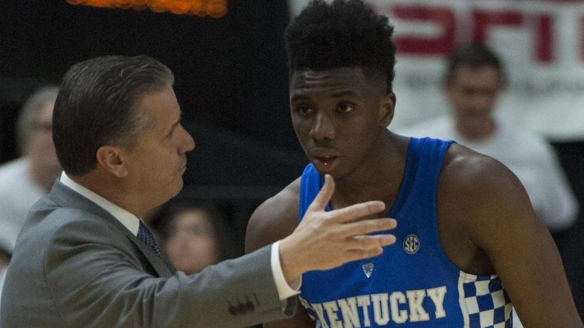 Kentucky head basketball coach John Calipari talks with redshirt freshman guard Hamidou Diallo during the Wildcats’ 85-74 loss to the Texas A&M Aggies in Reed Arena at College Station, TX on Saturday, Feb. 10, 2018.