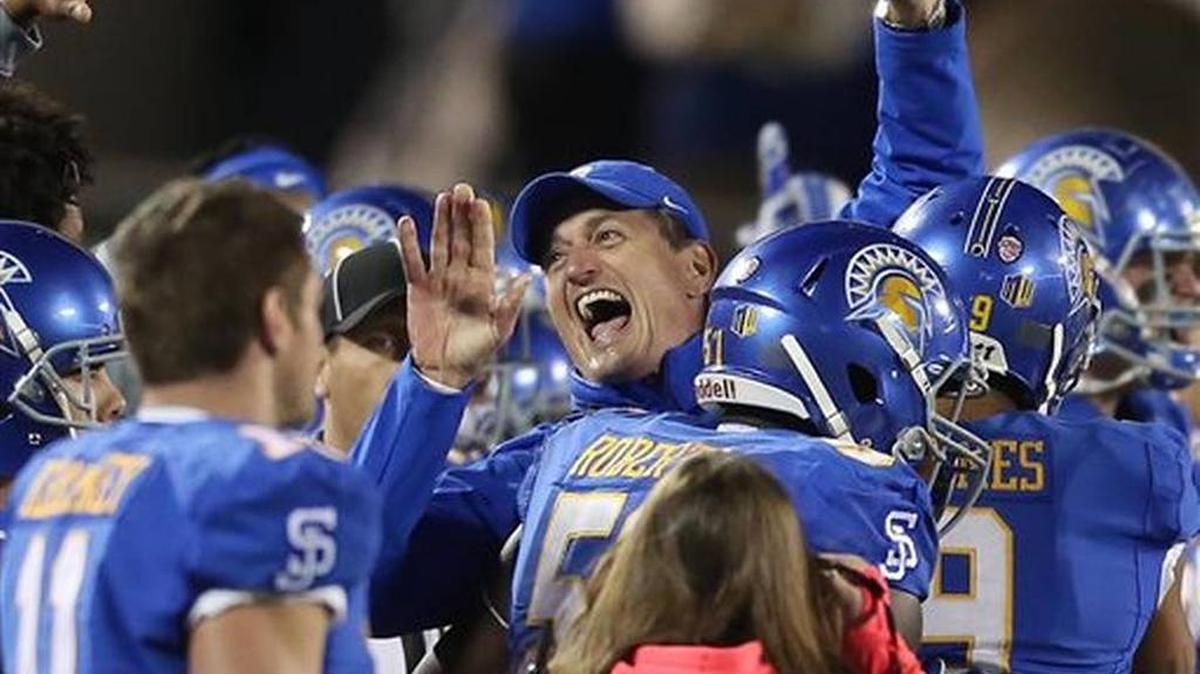 San Jose State head coach Ron Caragher celebrates after defeating Georgia State in the Cure Bowl NCAA college football game, Saturday, Dec. 19, 2015 in Orlando, Fla.