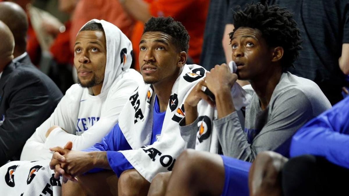 Kentucky guard Isaiah Briscoe (13), guard Malik Monk (5) and guard De’Aaron Fox (0) watched the last few minutes of UK’s 88-66 loss to Florida from the bench in Exactech Arena at the Stephen C. O'Connell Center in Gainesville, Fl., Saturday, February 4, 2017.