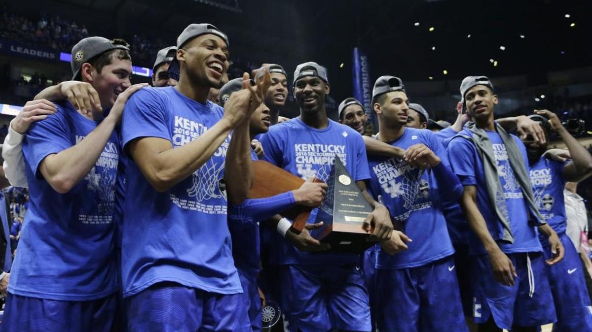 Kentucky celebrated with the tournament trophy after their win over Texas A&M in the SEC Men's Basketball Tournament Championship game at Bridgestone Arena in Nashville, Tenn., on March 13, 2016. Kentucky beat A&M 82-77 to win the 2016 championship.