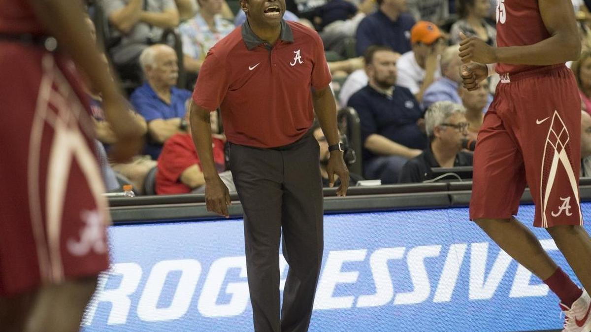 Alabama head coach Avery Johnson instructs his players during the first half of the Advocare Invitational college basketball game against Xavier, Thursday, Nov. 26, 2015, in Orlando, Fla.