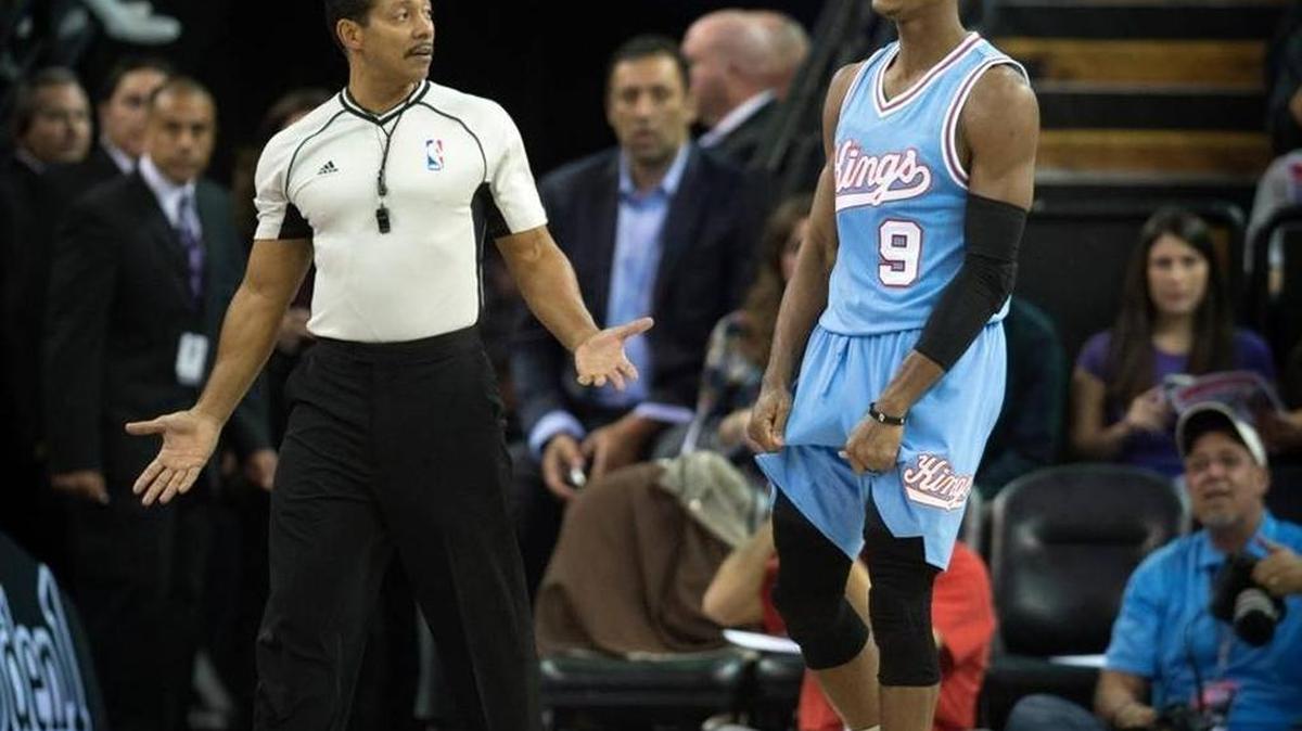 NBA referee Bill Kennedy (55) talked with Sacramento Kings guard Rajon Rondo (9) during a game against the Minnesota Timberwolves in Sacramento on Friday, Nov. 27, 2015. Rondo was suspended a game after he was given a technical by Kennedy in Mexico City in early December after allegedly making a slur at him.