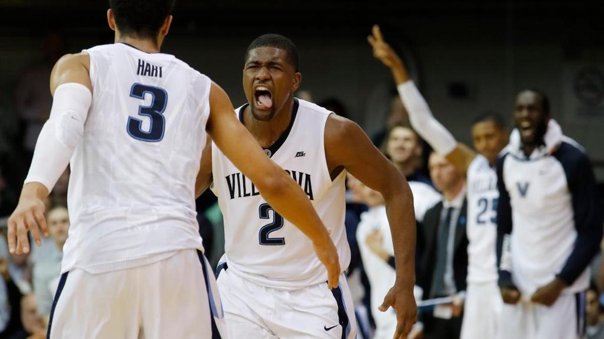 Villanova’s Kris Jenkins (2) celebrates with Josh Hart (3) during the second half of an NCAA college basketball game against Butler, Saturday, Feb. 20, 2016, in Villanova, Pa. Villanova won 77-67.