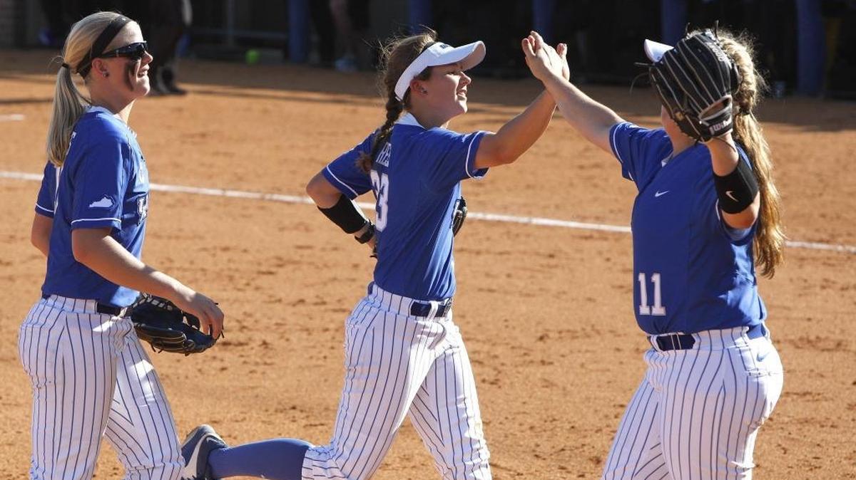 UK’s Katie Reed slaps hands with Abbey Cheek after completing the double play in the third inning against Missouri at John Cropp Stadium in Lexington, Ky., Saturday, April 16, 2016.