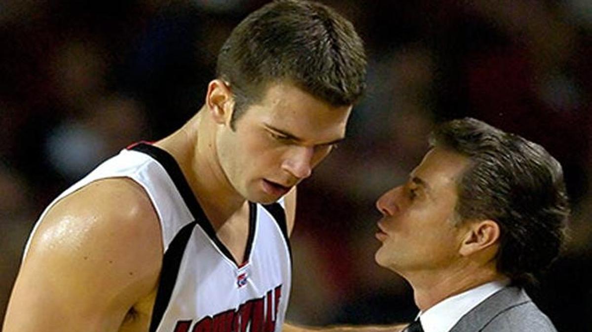 As a player, Louisville center David Padgett listens to instructions from head coach Rick Pitino. Now an assitant coach at U of L, Padgett has been named interim coach for the 2017-18 season.