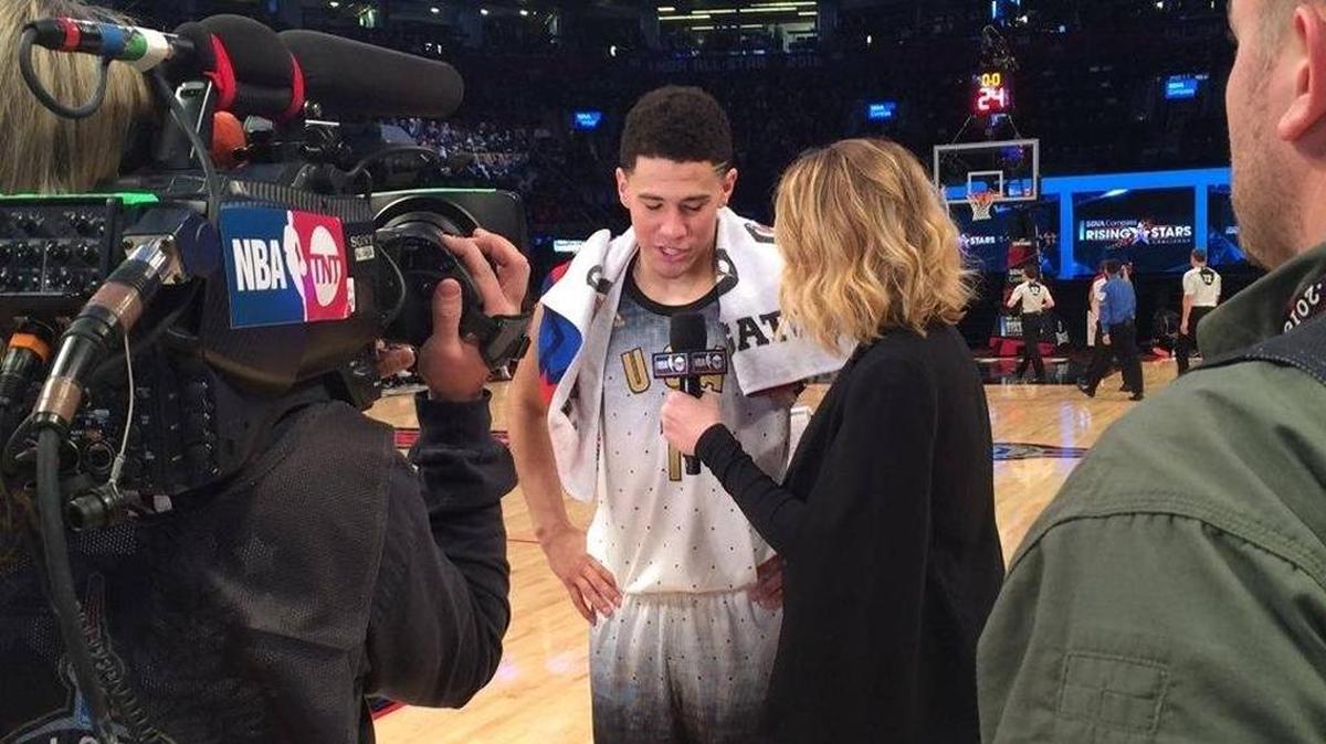 Devin Booker, who hit four three-pointers and scored 18 points in the first half, was interviewed by Kristen Ledlow at halftime of the Rising Stars Challenge game that was part of the NBA’s All-Star Weekend in 2016. The former UK star finished fourth in NBA Rookie of the Year voting.