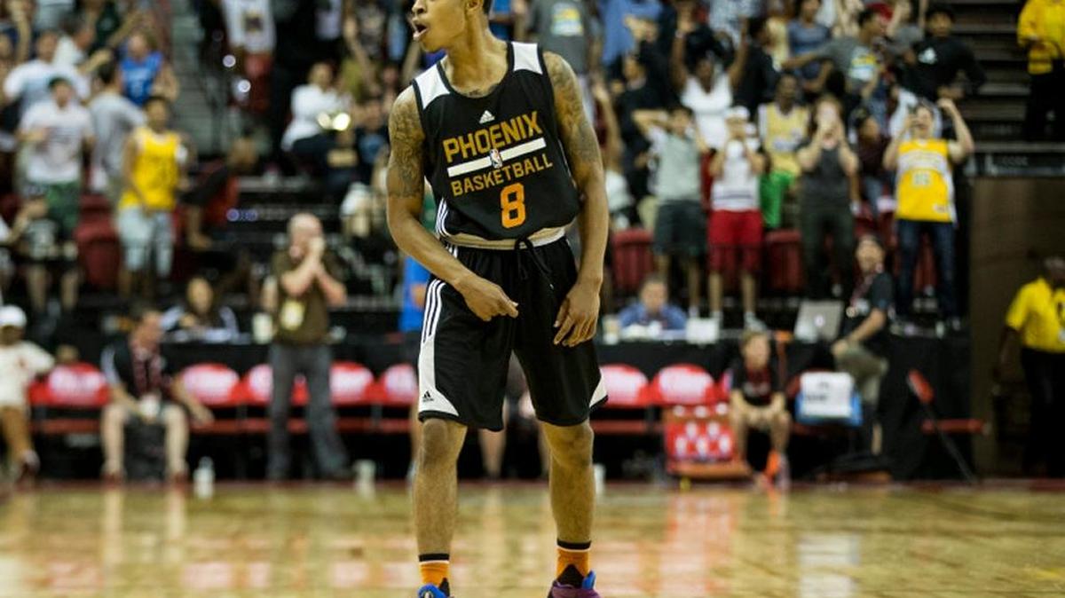 Phoenix Suns’ Tyler Ulis (8) reacts after making a shot at the buzzer shot to defeat the Denver Nuggets 82-81 in overtime an NBA summer league basketball game at the Thomas & Mack Center on Saturday, July 16, 2016, in Las Vegas.