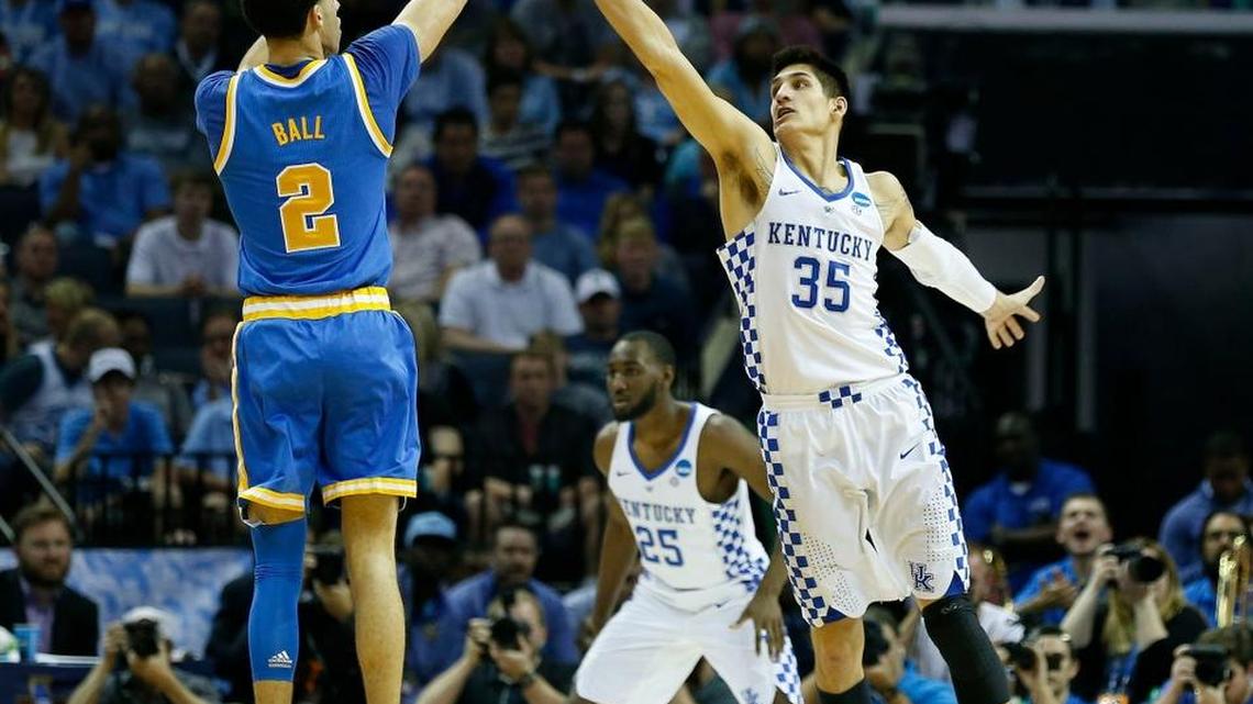 Kentucky forward Derek Willis (35) pressured UCLA guard Lonzo Ball (2) during UK’s 86-75 win over the Bruins in the NCAA South Region semifinals at FedExForum in Memphis, Tn., Friday, March 24, 2017.