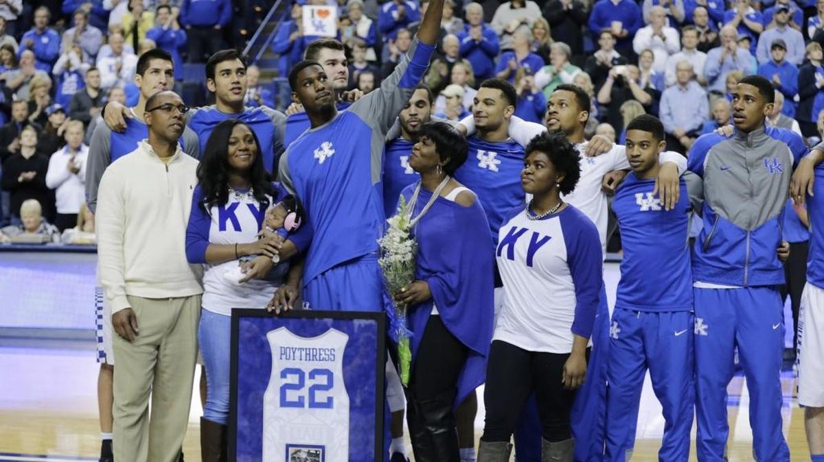 Alex Poythress (22) with family, from left, father Antoine Poythress, sister Alexis holding her daughter Alivia, and his mother Regina Poythress, during Senior Day events before the LSU at Kentucky men's basketball game at Rupp Arena in Lexington, Ky, on March 5, 2016.
