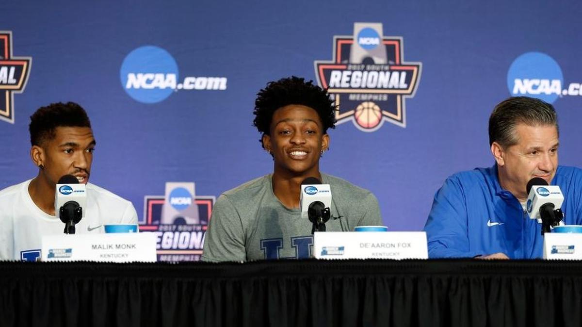 Kentucky guards Malik Monk (left) and De'Aaron Fox (center) and head coach John Calipari spoke during an afternoon press conference at FedExForum in Memphis, Tenn. on Saturday, March 25, 2017. UK plays North Carolina Sunday for the NCAA South Region championship.
