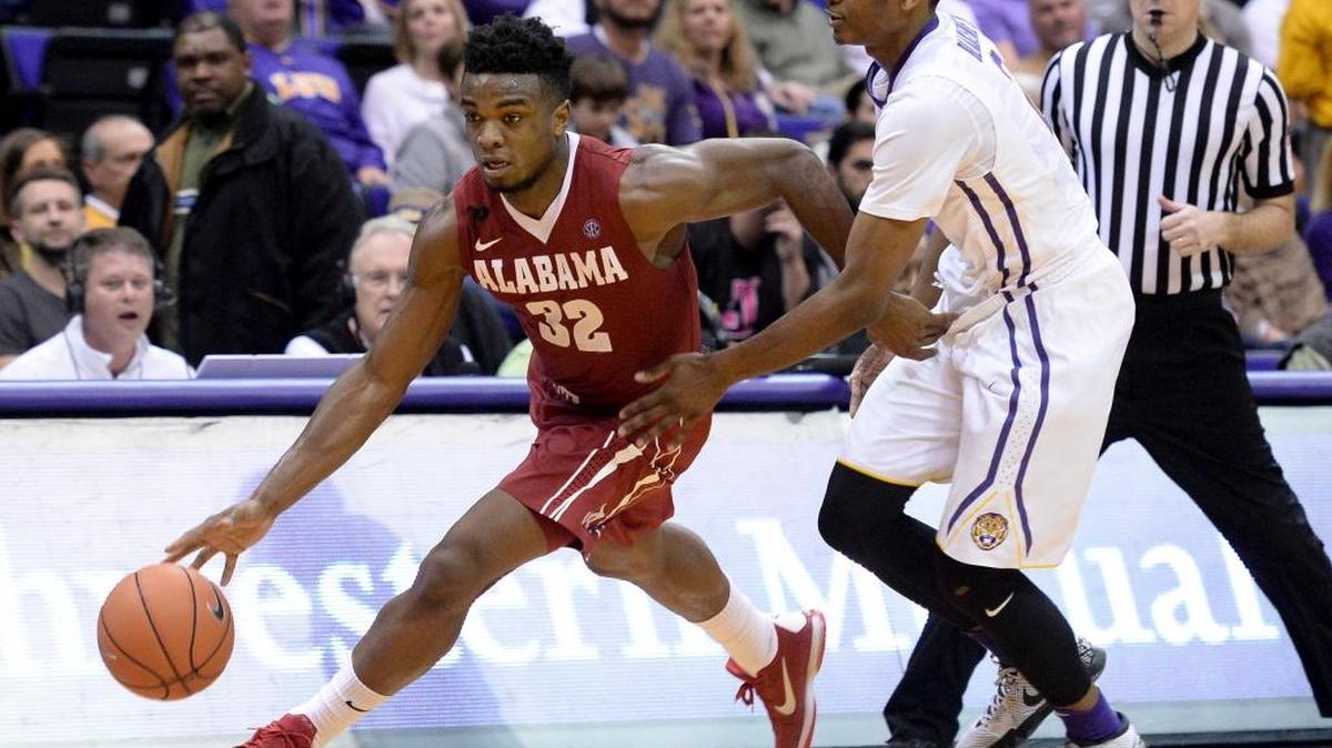 Alabama guard Retin Obasohan (32) drives past LSU guard Antonio Blakeney during an NCAA college basketball game Wednesday, Feb. 17, 2016, in Baton Rouge, La. Alabama won 76-69.