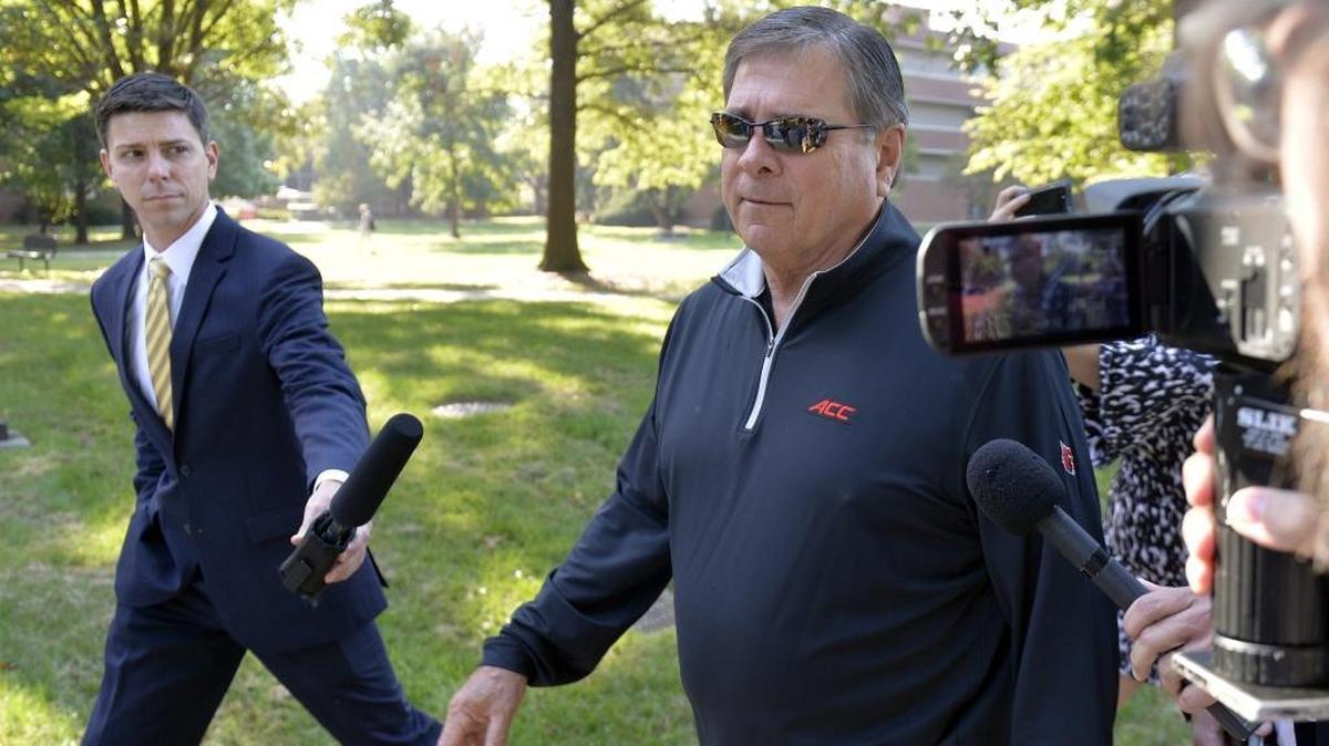 University of Louisville athletic director Tom Jurich arrives at the University's administration building for a meeting, Wednesday, Sept. 27, 2017, in Louisville, Ky. Jurich was placed on paid administrative leave in wake of an FBI investigation into fraud and bribery involving college basketball.