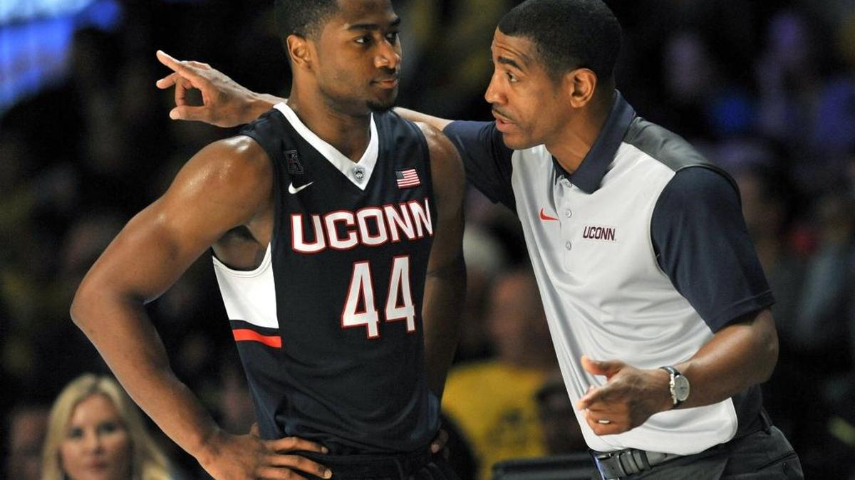 Connecticut head coach Kevin Ollie has a word with guard Rodney Purvis (44) in a first-round game against Michigan in The Battle 4 Atlantis at Imperial Arena in Nassau, Bahamas, on Wednesday, Nov. 25, 2015. UConn won, 74-60.