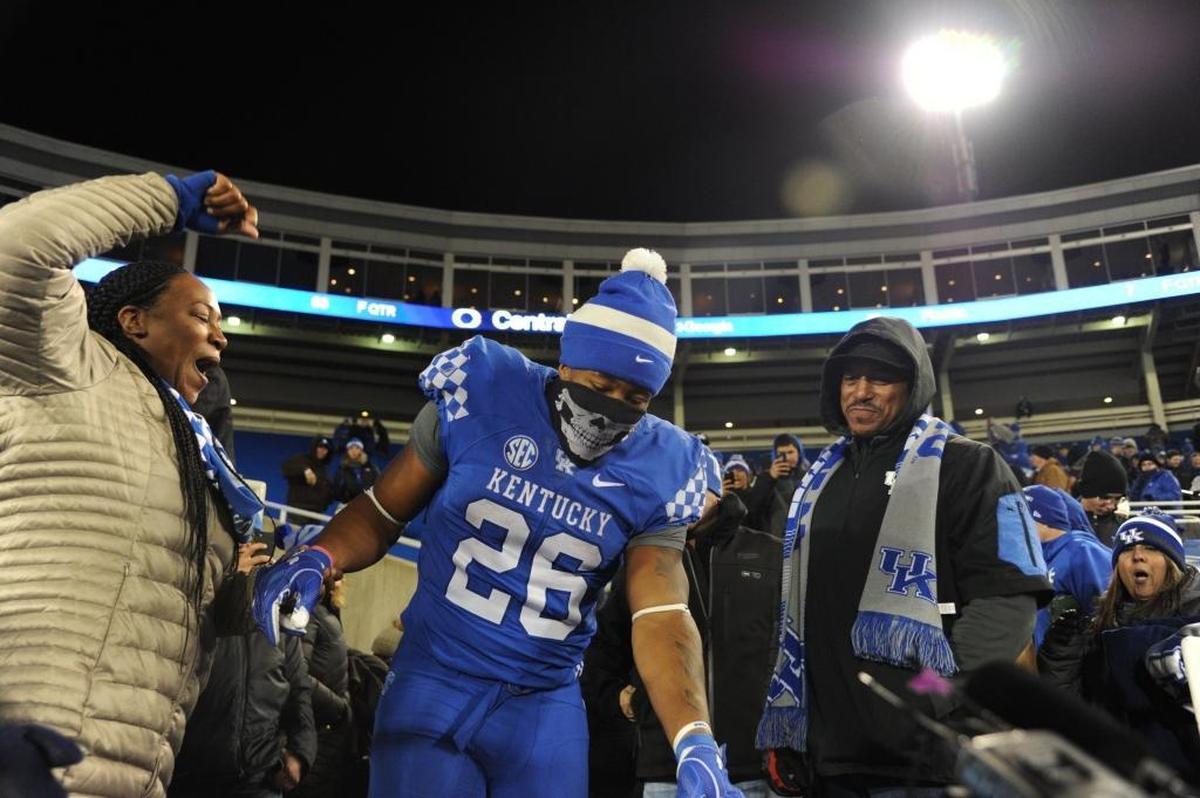 Sophomore running back Benny Snell left the stands after celebrating with his mom, April, and his father, Ben Snell, Sr., after Kentucky’s 29-26 win over Tennessee last season.
