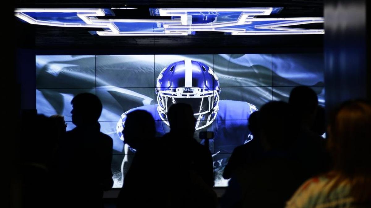 Wall size projections and logos on the ceiling in the UK locker room at the new UK Football Training Facility on Friday July 22, 2016 in Lexington, Ky.