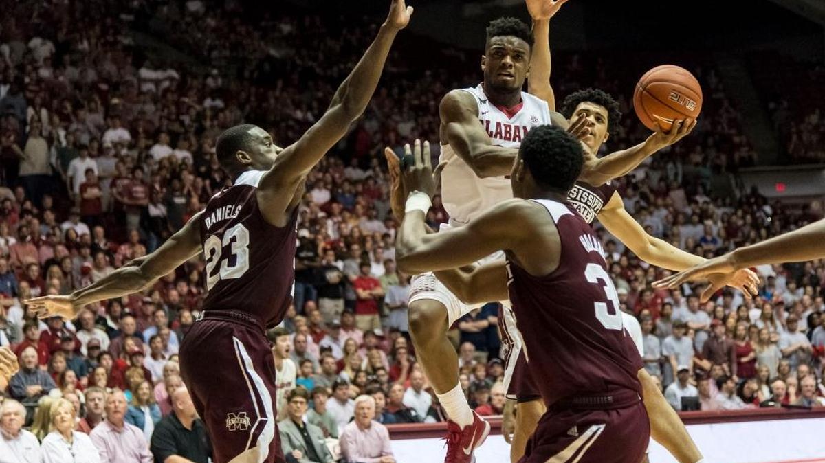 Alabama guard Retin Obasohan (32) gets inside during an NCAA college basketball game against Mississippi State Saturday, Feb. 20, 2016, at Coleman Coliseum in Tuscaloosa, Ala.