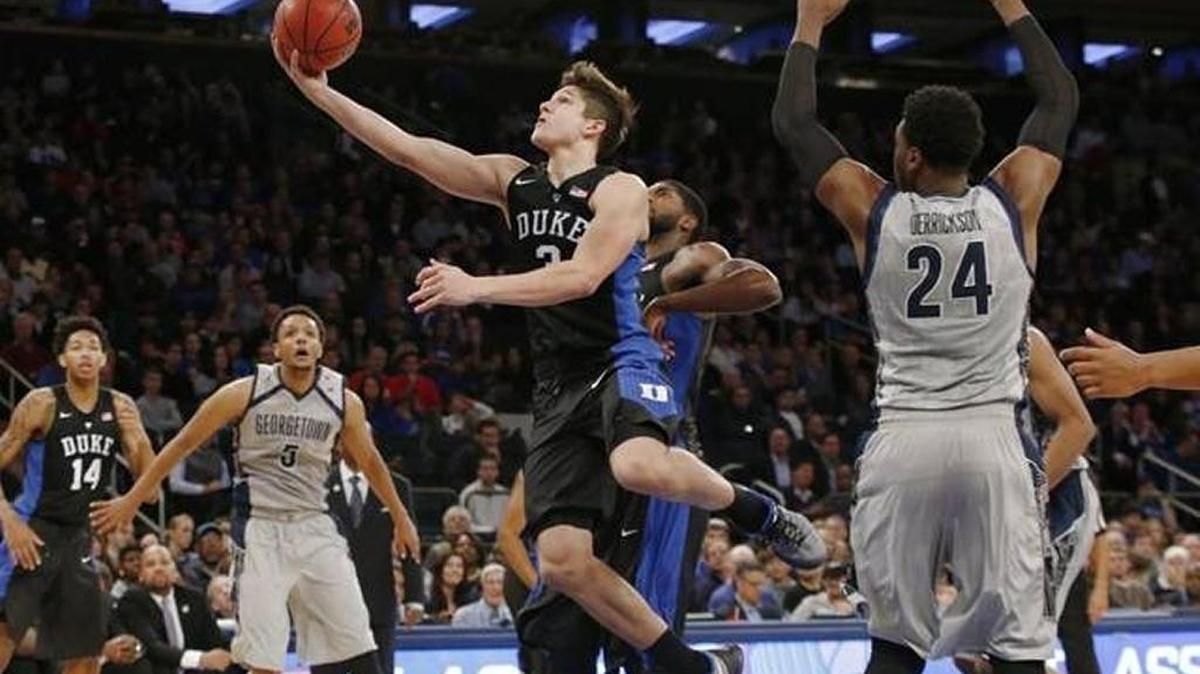 Duke’s Grayson Allen, shown here against Georgetown early in the season, was publicly reprimanded by the ACC for intentionally tripping an opposing player.