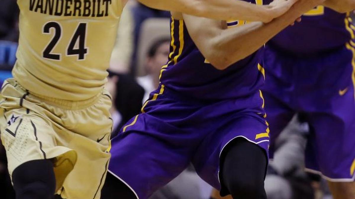 Vanderbilt's Nolan Cressler attempts to steal the ball from LSU's Ben Simmons (25) during an NCAA college basketball game Saturday, Jan. 2, 2016, in Nashville, Tenn.