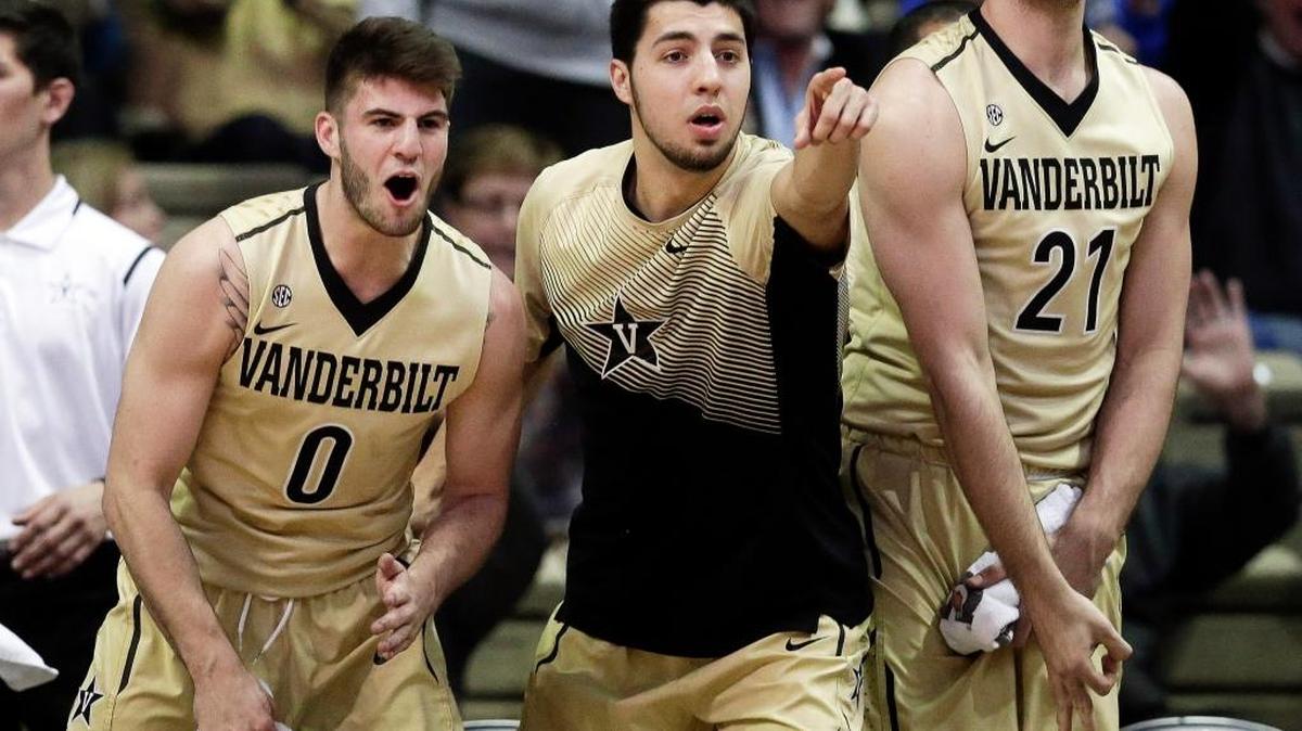Vanderbilt players Camron Justice (0), Nolan Cressler, center, and Samir Sehic (21) celebrate in the second half of an NCAA college basketball game against Texas A&M Thursday, Feb. 4, 2016, in Nashville, Tenn. Vanderbilt won 77-60.