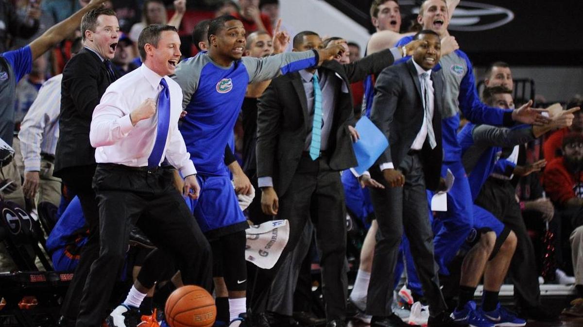 Florida coach Mike White and the Florida bench react as a ball rolls out of bounds during the second half of an NCAA college basketball game against Georgia on Tuesday, Feb. 16, 2016, in Athens, Ga. Florida won 57-53.